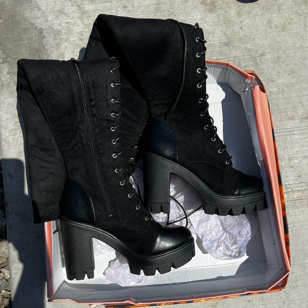 Brand new in box knee high boots
